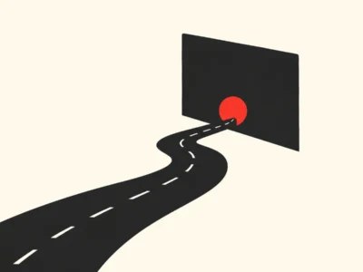 Winding black road with white lane markings curves toward a red sun peeking through a dark wall against a pale background.