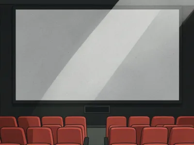 Empty movie theater with red upholstered seats facing a large blank screen on a dark wall.