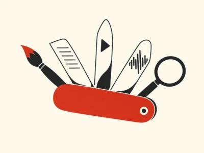 Red multi-tool with expanding blades-a brush, ruler, play-icon blade, audio waveform blade, and a magnifying glass.