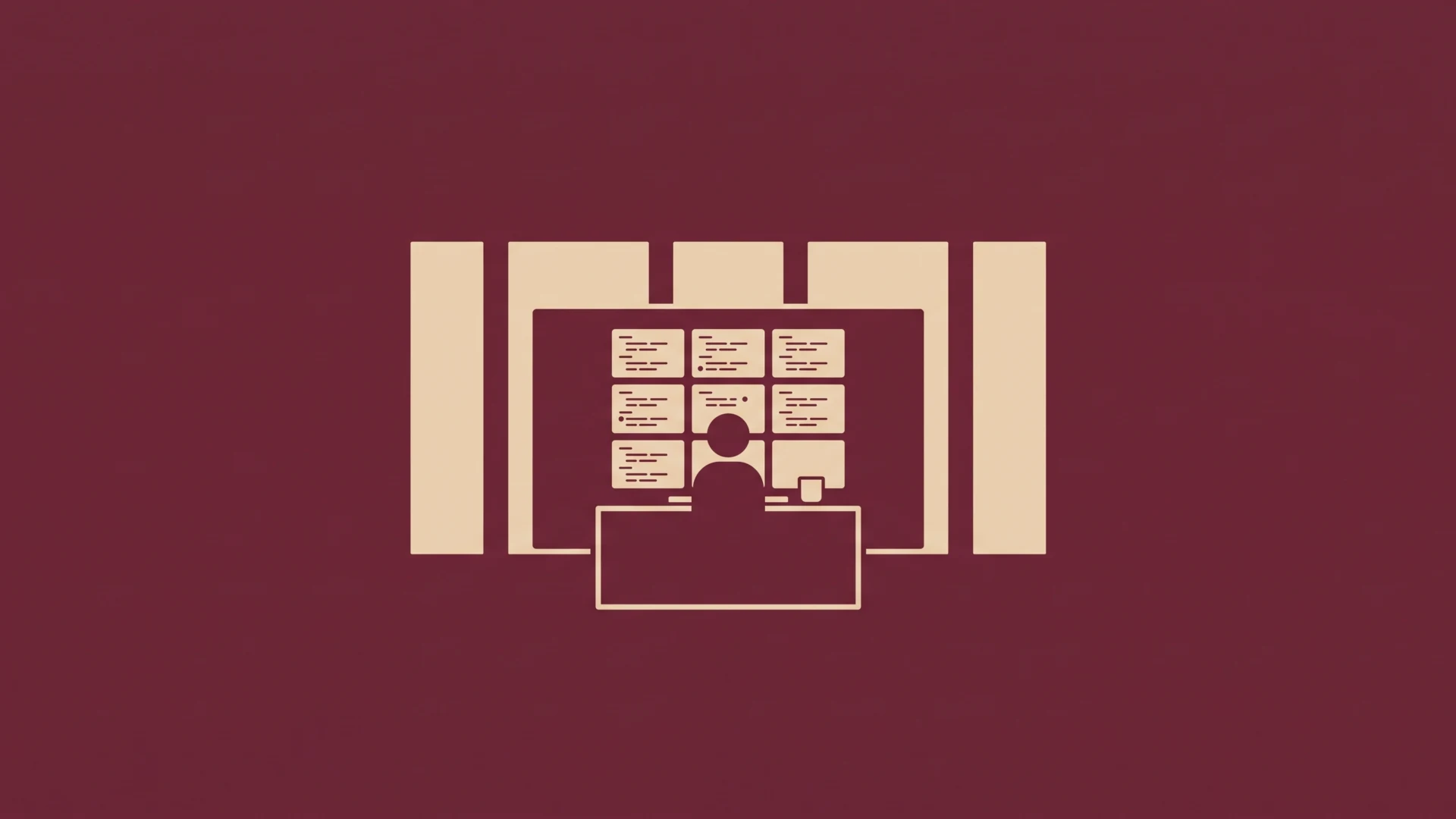 Silhouette of a person sitting at a desk in front of a large monitor with several smaller screens around, suggesting a video conference setup.