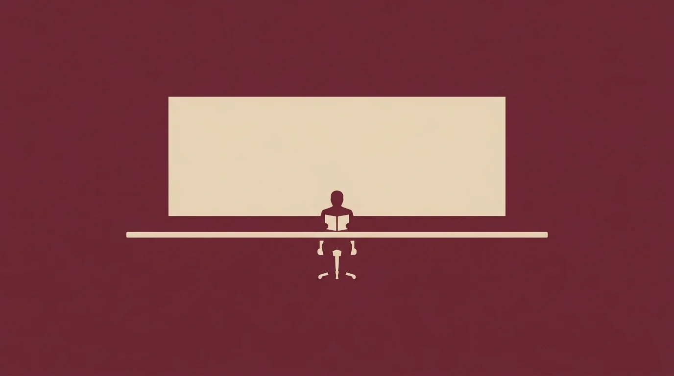 Minimalist silhouette of a person reading a book at a desk with a large pale screen behind them